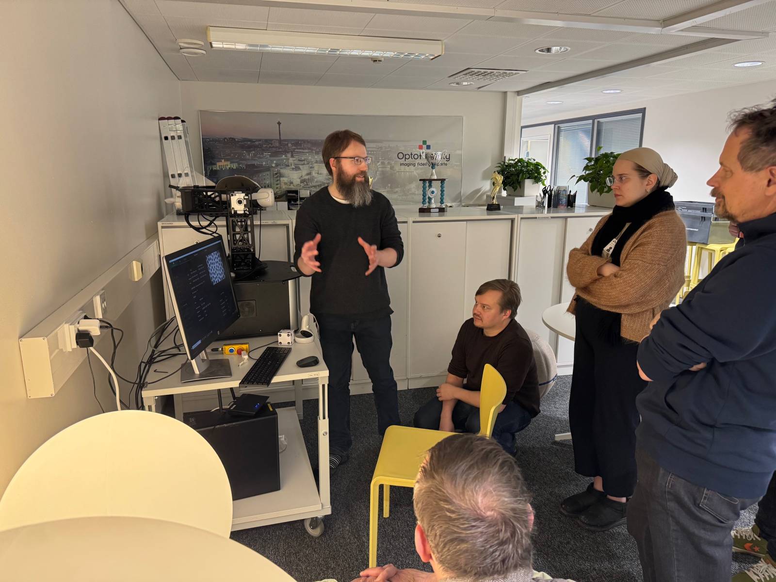 Workshop attendees Tampere University checking out Optofidelity's XR optimation system, presented by Optofidelity's attendees.